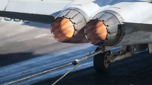 Gulf of Oman, February 17, 2013 - An F/A-18C Hornet catches an arresting gear wire on the flight deck of the aircraft carrier USS Harry S. Truman (CVN 75).