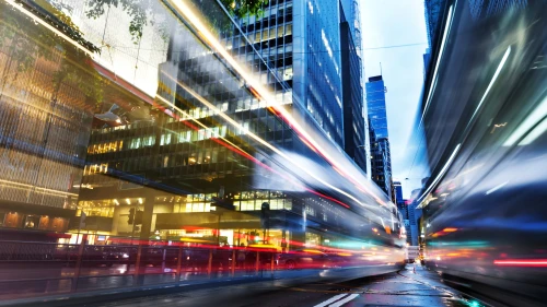 the light trails on the modern building background in Hong Kong China