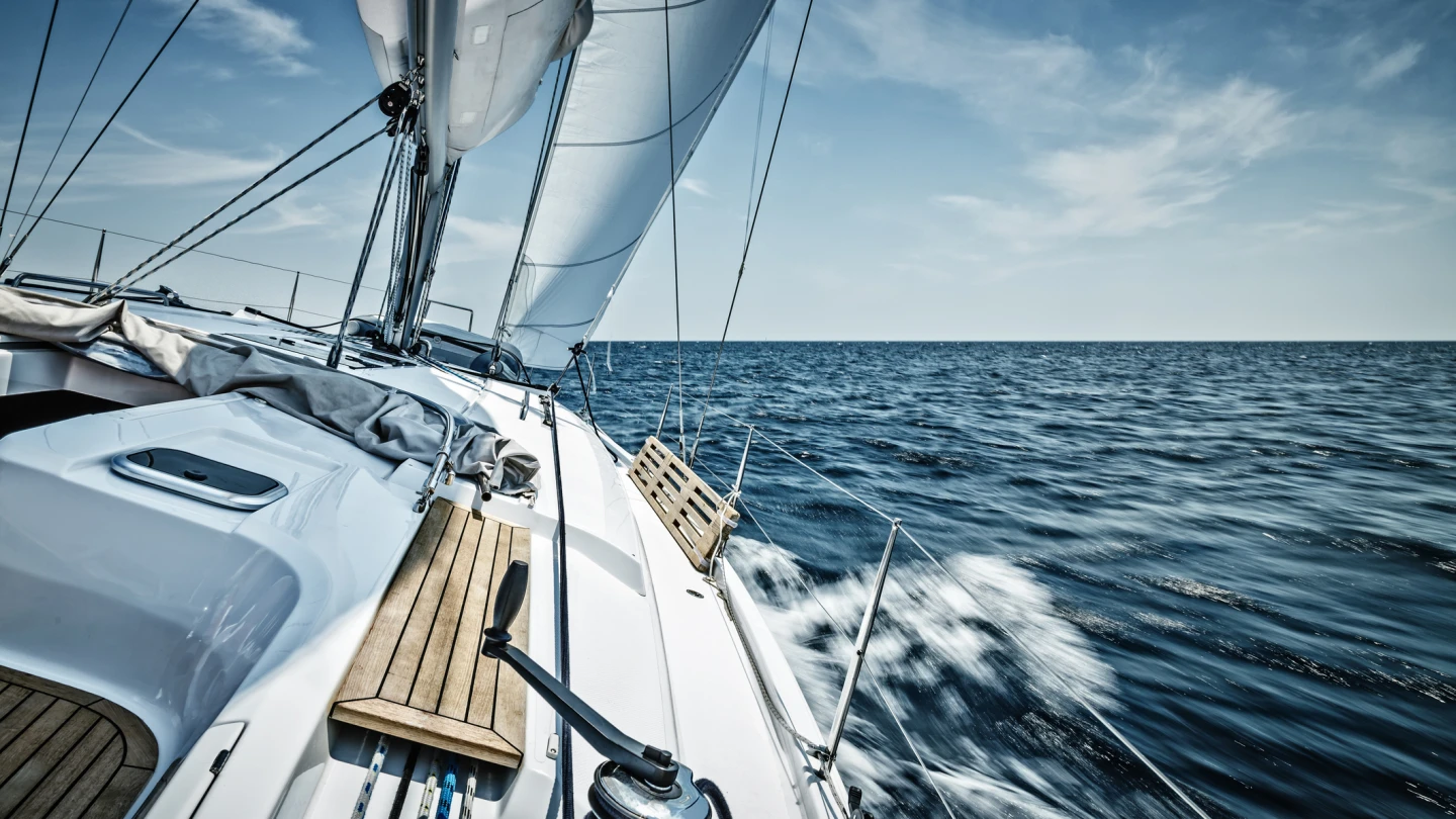 Sailing with sailboat. Long exposure.
