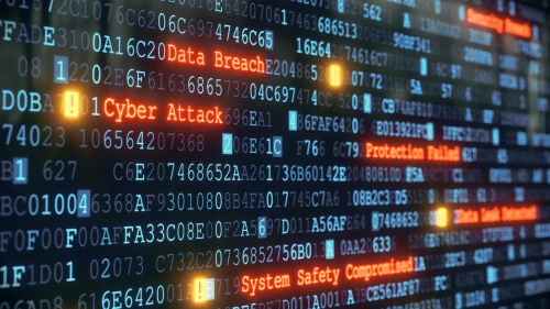 An abstract design of a terminal display, warning about a cyber attack. Multiple rows of hexadecimal code are interrupted by red glowing warnings and single character exclamation marks. The image can represent a variety of threats in the digital world: data theft, data leak, security breach, intrusion, anti-virus failure, etc...